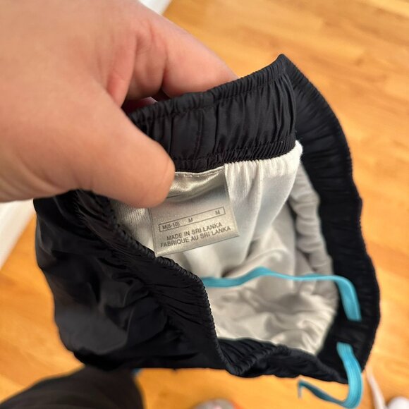 NIKE WOMENS SPORTSWEAR MID-RISE TEAL AND BLACK JOGGERS SIZE M - Picture 2 of 8